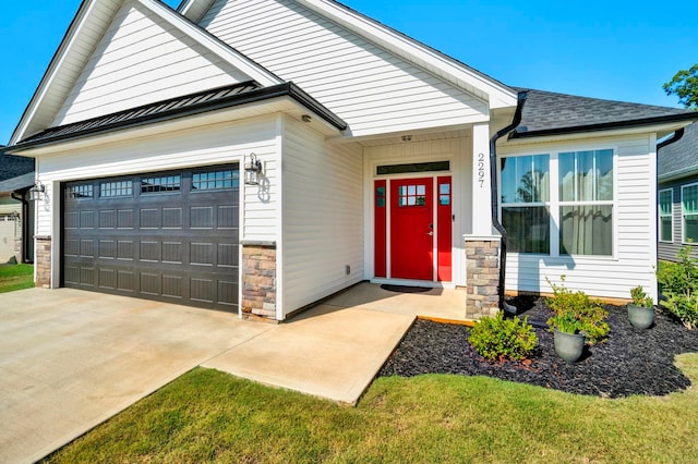 2297 Davenport Ct, Moore, SC 29369 - doorway to property with stone siding, a garage, and roof with shingles