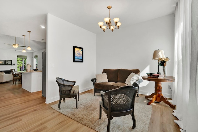 2297 Davenport Ct, Moore, SC 29369 - living room with a chandelier, light wood-style flooring, a ceiling fan, and recessed lighting