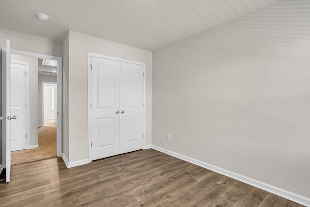 14 Sunriff Ct, Greer, SC 29651 - unfurnished bedroom with wood finished floors and a closet