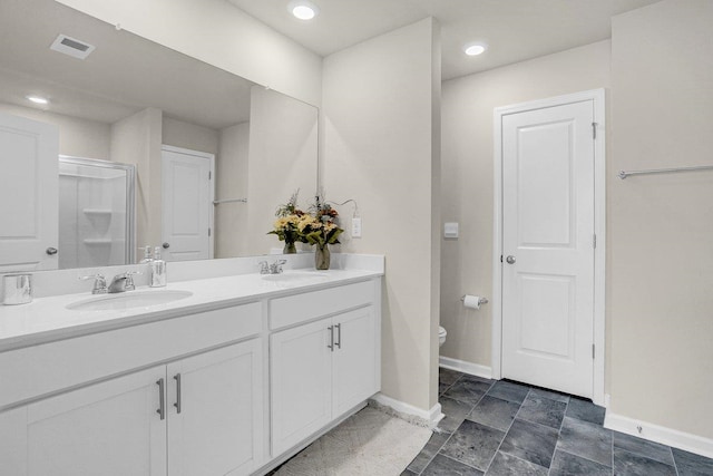 14 Sunriff Ct, Greer, SC 29651 - full bath featuring double vanity, a shower with shower door, and recessed lighting
