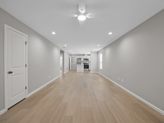 218 Caulder Cir, Spartanburg, SC 29306 - unfurnished living room featuring a ceiling fan, recessed lighting, and light wood-style flooring