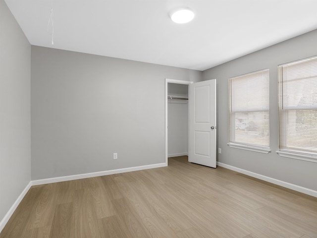 218 Caulder Cir, Spartanburg, SC 29306 - unfurnished bedroom featuring light wood finished floors and a closet