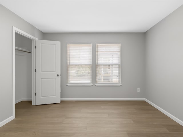 218 Caulder Cir, Spartanburg, SC 29306 - unfurnished bedroom featuring light wood-style floors and a closet