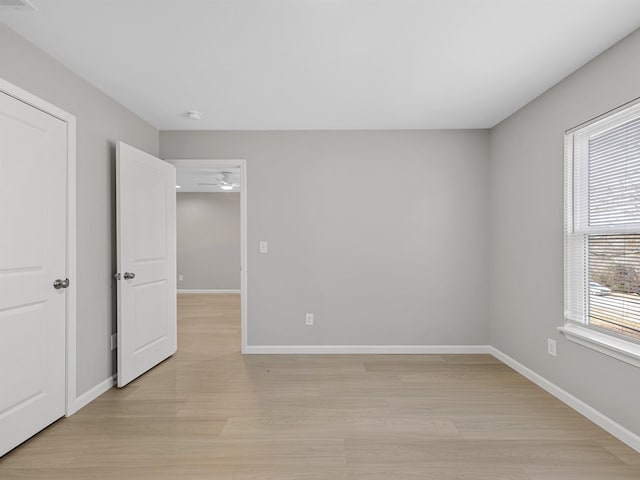 218 Caulder Cir, Spartanburg, SC 29306 - unfurnished bedroom with light wood finished floors and baseboards