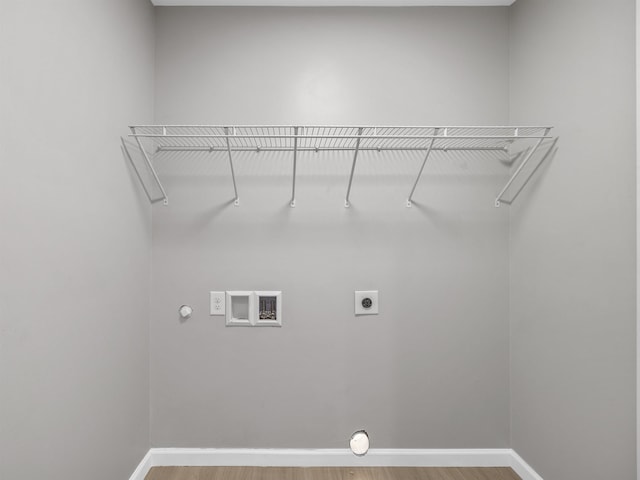 218 Caulder Cir, Spartanburg, SC 29306 - washroom with hookup for a washing machine, wood finished floors, hookup for an electric dryer, and gas dryer hookup