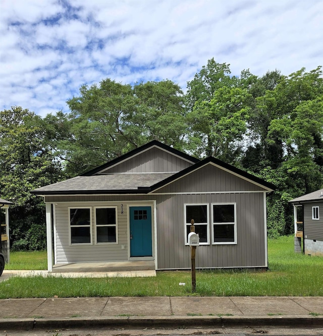 218 Caulder Cir, Spartanburg, SC 29306 - bungalow-style home featuring roof with shingles and view of scattered trees