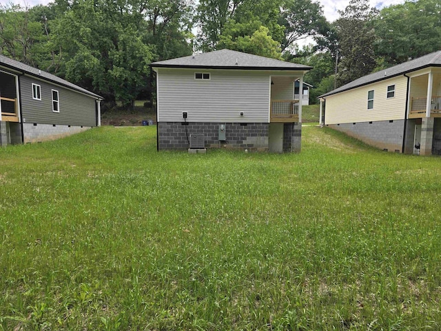 218 Caulder Cir, Spartanburg, SC 29306 - back of house with crawl space, a lawn, and view of scattered trees