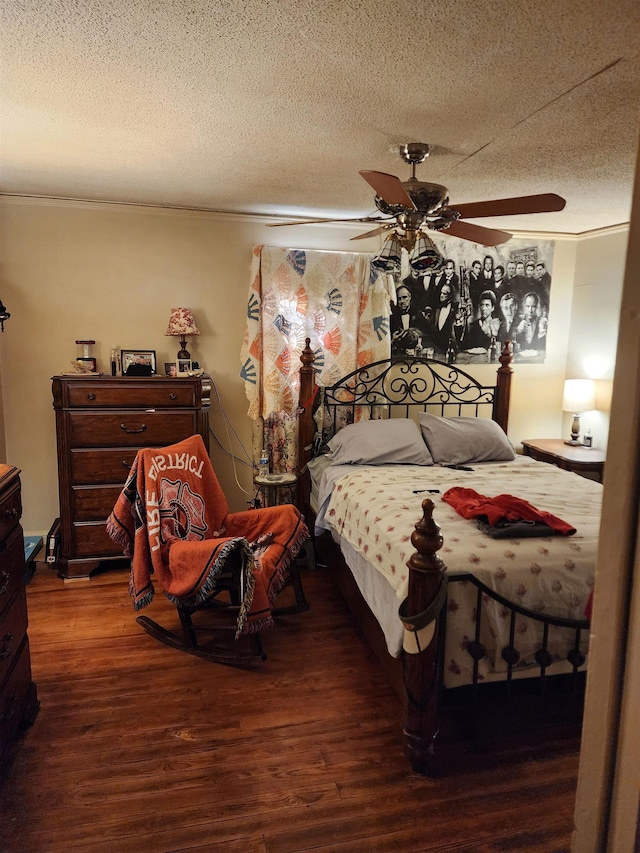 248 W Wood St, Spartanburg, SC 29303 - bedroom with wood finished floors, ceiling fan, and a textured ceiling