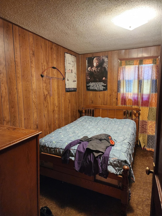 248 W Wood St, Spartanburg, SC 29303 - bedroom featuring carpet, wood walls, and a textured ceiling