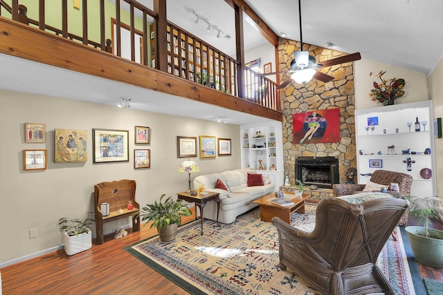 1114 Edisto Dr, Spartanburg, SC 29302 - living area with ceiling fan, wood finished floors, high vaulted ceiling, a fireplace, and built in features