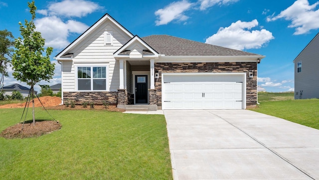 1312 Salix Ct, Spartanburg, SC 29303 - craftsman house featuring stone siding, driveway, a front lawn, and a garage