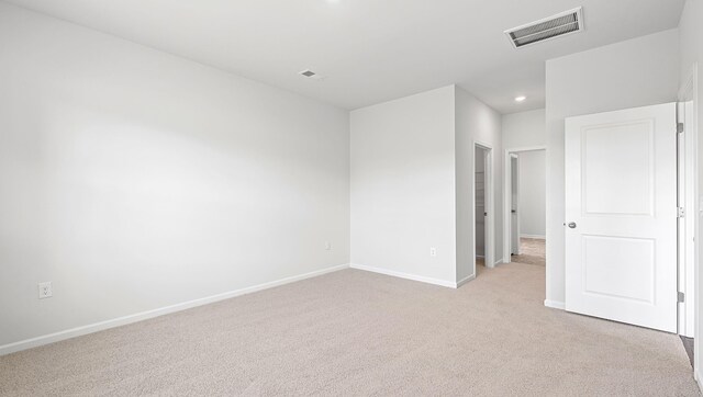 1312 Salix Ct, Spartanburg, SC 29303 - empty room featuring light carpet and recessed lighting