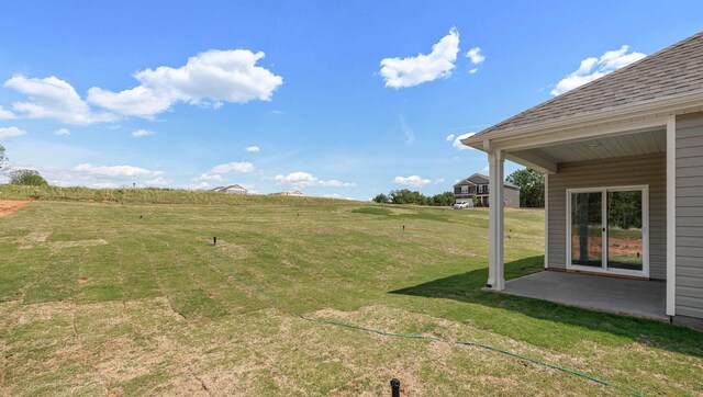 1312 Salix Ct, Spartanburg, SC 29303 - view of green lawn featuring a patio