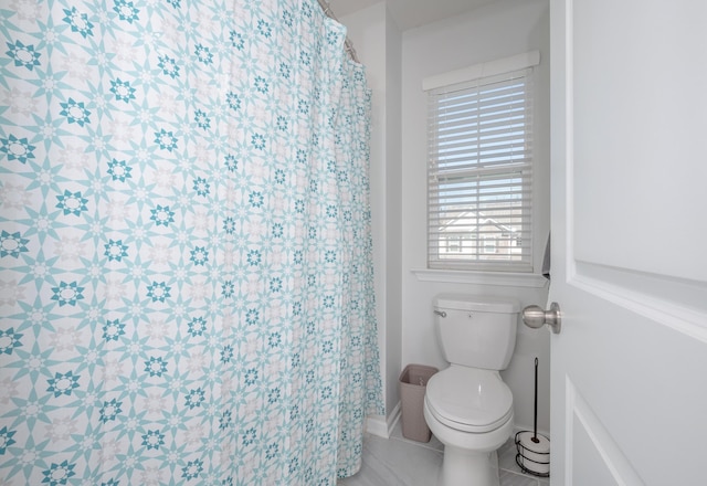 142 Magnolia St, Woodruff, SC 29388 - bathroom featuring toilet and curtained shower