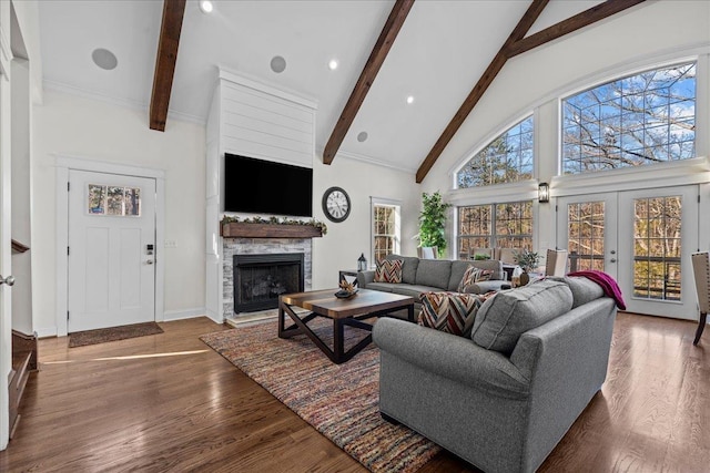 3664 River Rd, Union, SC 29379 - living room featuring beamed ceiling, high vaulted ceiling, a stone fireplace, wood finished floors, and recessed lighting