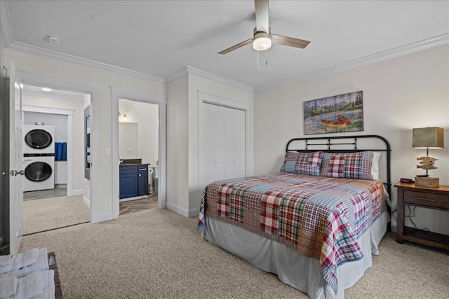 3664 River Rd, Union, SC 29379 - bedroom with stacked washing machine and dryer, light colored carpet, crown molding, a closet, and a ceiling fan
