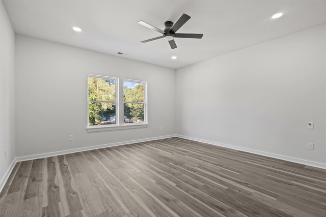 101 Daisy Ln, Easley, SC 29640 - empty room with a ceiling fan, wood finished floors, and recessed lighting