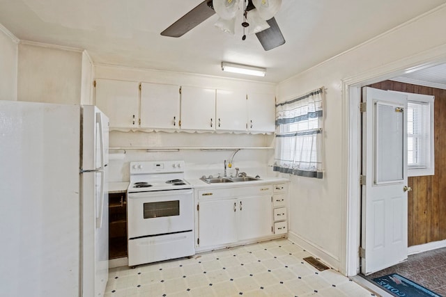 371 Tucapau Rd, Wellford, SC 29385 - kitchen with white appliances, light flooring, white cabinetry, and ceiling fan