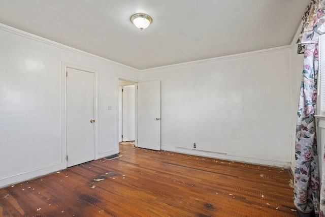 371 Tucapau Rd, Wellford, SC 29385 - unfurnished bedroom with hardwood / wood-style flooring and ornamental molding