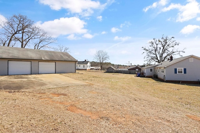 371 Tucapau Rd, Wellford, SC 29385 - view of yard featuring an outdoor structure and a garage