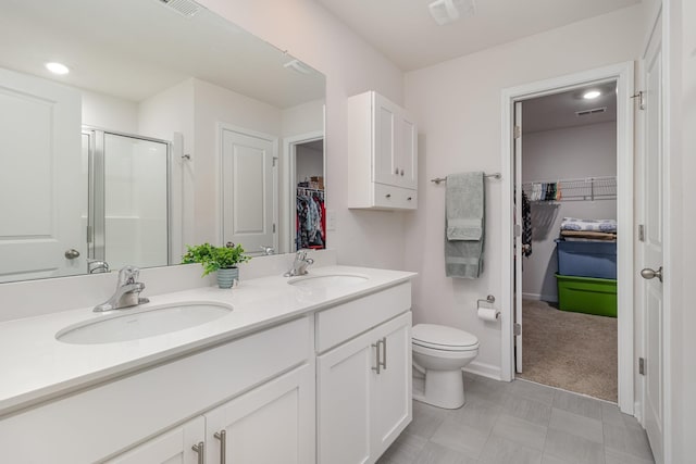 3812 Sapling Ln, Moore, SC 29369 - full bath with a walk in closet, a stall shower, double vanity, and recessed lighting