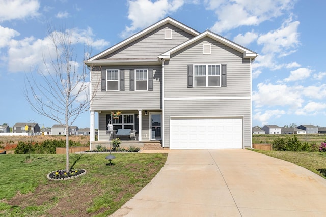 3812 Sapling Ln, Moore, SC 29369 - view of front of property with covered porch, a garage, a front lawn, and driveway