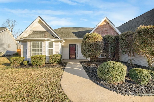106 Brandi Starr Ct, Greer, SC 29651 - view of front facade featuring a front yard and a shingled roof