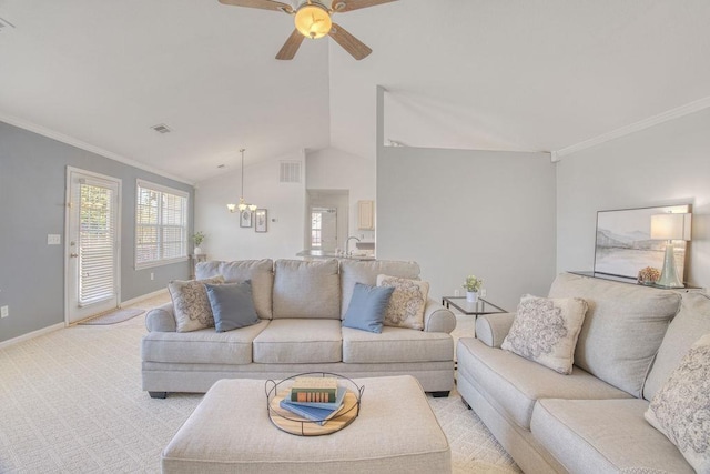 106 Brandi Starr Ct, Greer, SC 29651 - living room with a chandelier, ornamental molding, a ceiling fan, vaulted ceiling, and light colored carpet