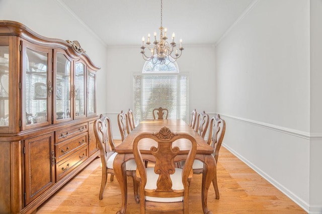 106 Brandi Starr Ct, Greer, SC 29651 - dining area with a chandelier, light wood-type flooring, healthy amount of natural light, and ornamental molding