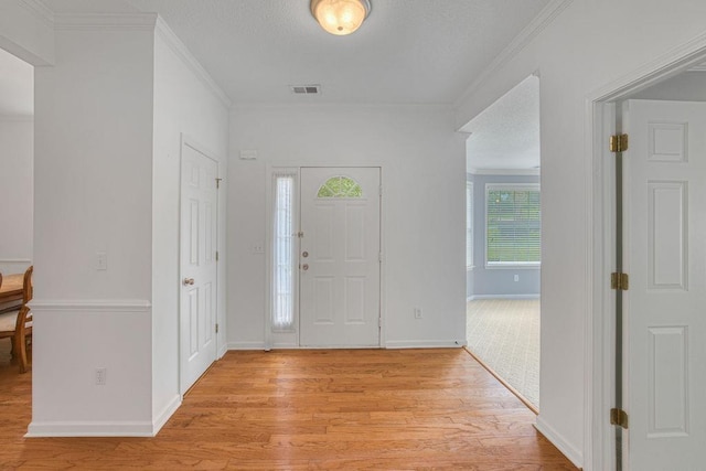 106 Brandi Starr Ct, Greer, SC 29651 - foyer entrance featuring light wood-type flooring and crown molding