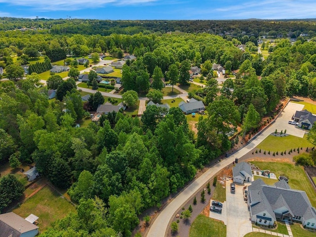 106 Brandi Starr Ct, Greer, SC 29651 - aerial perspective of suburban area featuring a heavily wooded area