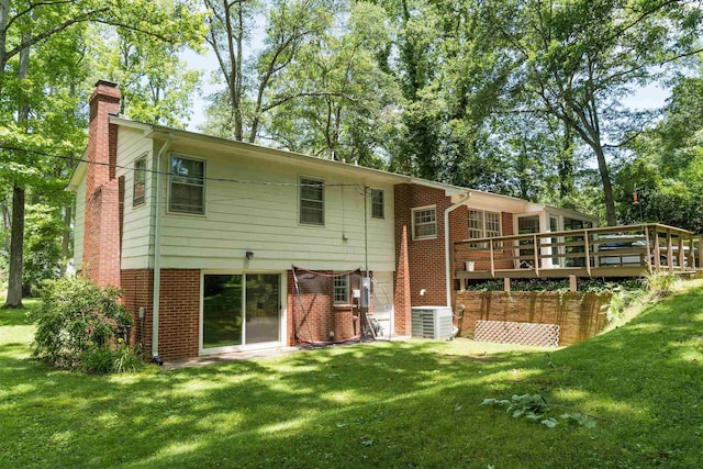 1105 Partridge Rd, Spartanburg, SC 29302 - back of property with a chimney, brick siding, and a lawn