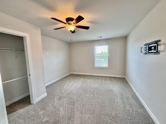 637 Grays Creek Rd, Spartanburg, SC 29303 - unfurnished bedroom featuring carpet flooring, ceiling fan, and a closet