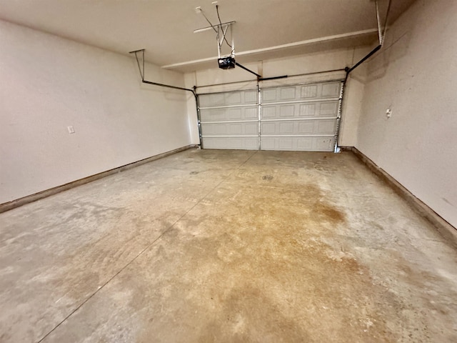 637 Grays Creek Rd, Spartanburg, SC 29303 - garage featuring a garage door opener and baseboards