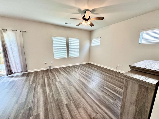 637 Grays Creek Rd, Spartanburg, SC 29303 - unfurnished room featuring ceiling fan and dark wood-style flooring