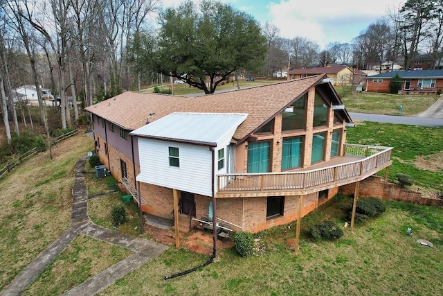 1109 Hemlock Dr, Shelby, NC 28150 - rear view of property with a deck, a lawn, brick siding, and roof with shingles