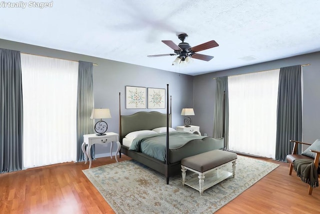 1109 Hemlock Dr, Shelby, NC 28150 - bedroom with light wood finished floors and a ceiling fan