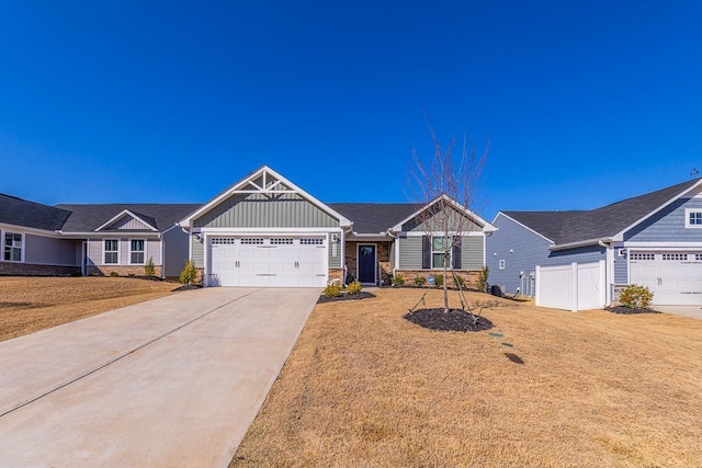 2086 Wexley Dr, Boiling Springs, SC 29316 - craftsman-style home featuring board and batten siding, a garage, concrete driveway, and stone siding