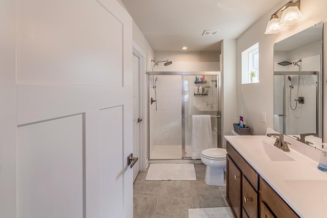 2086 Wexley Dr, Boiling Springs, SC 29316 - bathroom with a stall shower, double vanity, and recessed lighting