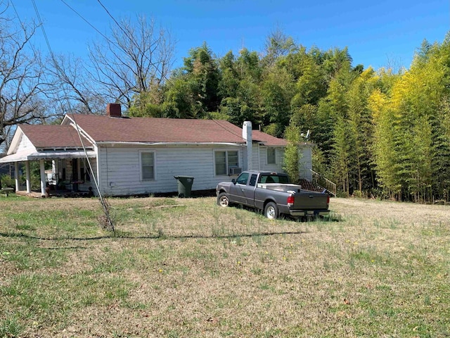 311 Arthur Blvd, Union, SC 29379 - view of property exterior with a yard and a chimney