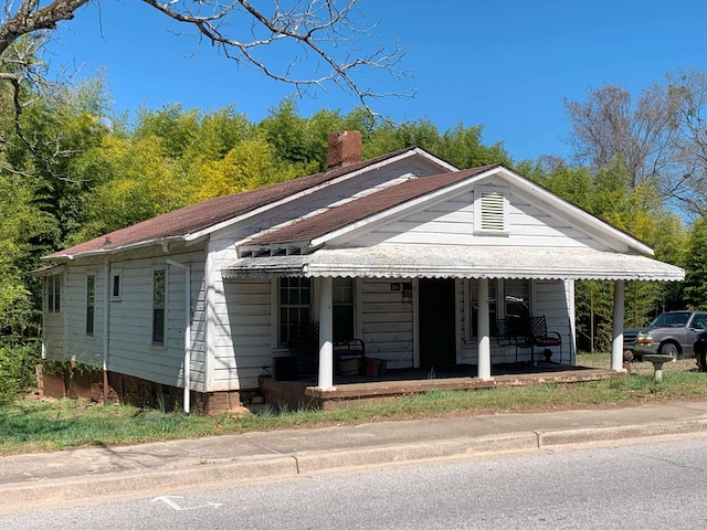311 Arthur Blvd, Union, SC 29379 - view of front of home with covered porch and a chimney