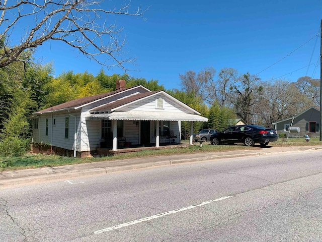 311 Arthur Blvd, Union, SC 29379 - view of front of property featuring a porch and a chimney