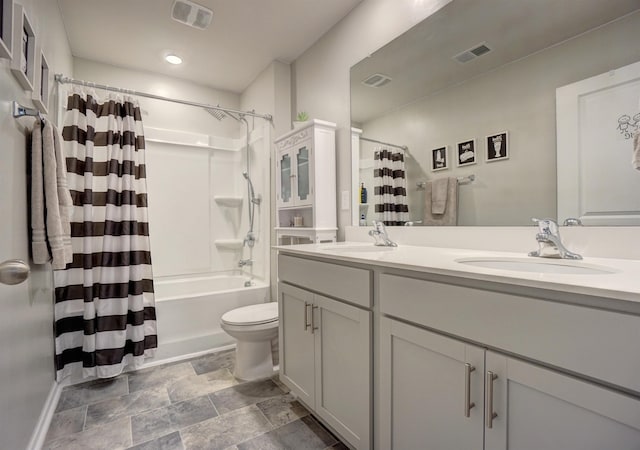 1470 Talley Ridge Dr, Woodruff, SC 29388 - bathroom with double vanity, shower / bathtub combination with curtain, and stone finish flooring