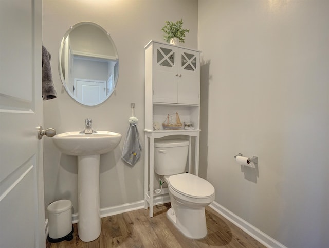 1470 Talley Ridge Dr, Woodruff, SC 29388 - half bathroom with toilet and wood finished floors