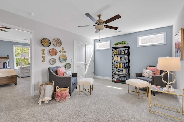 1034 Silverbend Trl, Duncan, SC 29334 - living area featuring ceiling fan, carpet floors, and plenty of natural light