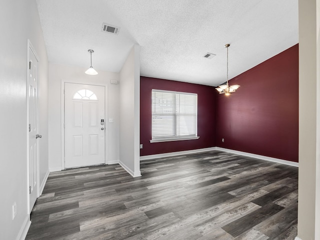 461 Candleglow Dr, Boiling Springs, SC 29316 - entrance foyer featuring a chandelier, wood finished floors, a textured ceiling, and lofted ceiling