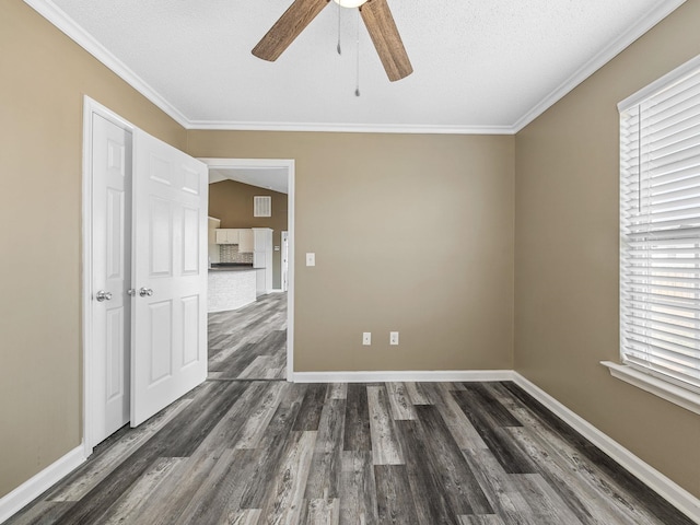 461 Candleglow Dr, Boiling Springs, SC 29316 - empty room with dark wood-style flooring, ceiling fan, and crown molding