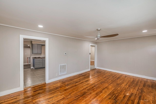 107 Ravenscroft St, Union, SC 29379 - unfurnished room with wood finished floors, ceiling fan, arched walkways, recessed lighting, and ornamental molding