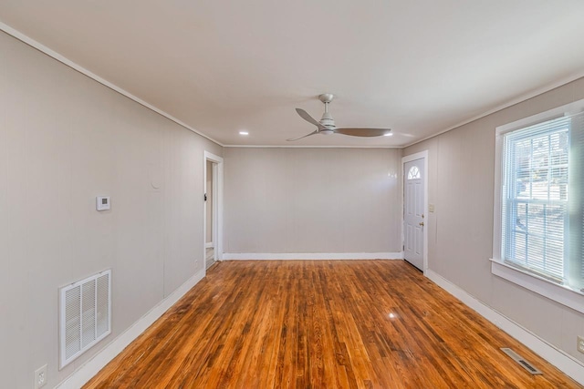 107 Ravenscroft St, Union, SC 29379 - empty room with wood finished floors, ceiling fan, crown molding, and recessed lighting