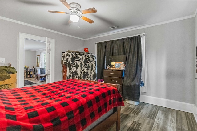 121 Holland St, Gaffney, SC 29341 - bedroom with wood finished floors, ornamental molding, and ceiling fan